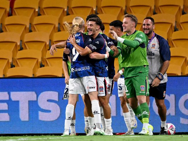 Jets players celebrated after Lachlan Rose’s goal at Suncorp Stadium. Picture; Bradley Kanaris/Getty Images