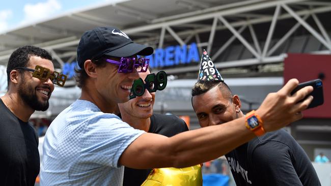 Rafael Nadal takes a selfie with Jo-Wilfried Tsonga, Andy Murray and Nick Kyrgios. Picture: Saeed Khan/AFP