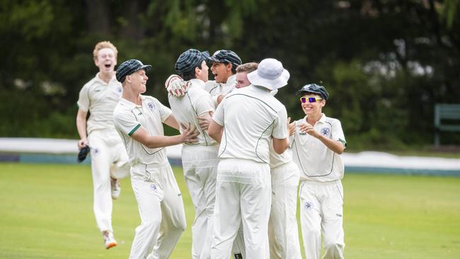 BBC celebrate a wicket in the GPS cricket game between Brisbane Boys College BBC and TSS earlier in the year. (AAP Image/Richard Walker)