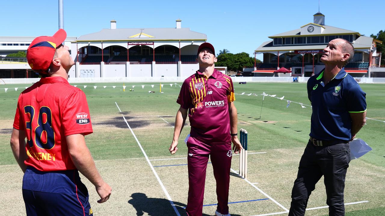 McSweeney (left) and Marnus Labuschagne toss the coin before the start of a South Australia vs. Queensland One-Day Cup game last month. Picture: Chris Hyde / Getty Images