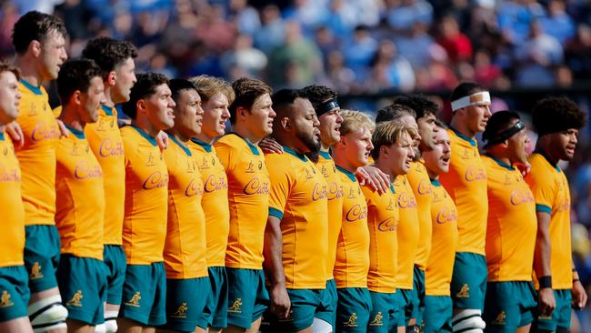 The Wallabies line up for the national anthem. Picture: GERONIMO URANGA / AFP