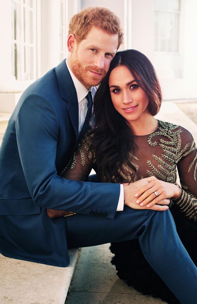 Britain's Prince Harry posing with his fiance US actress Meghan Markle. Picture: AFP/Alexi Lubomirski