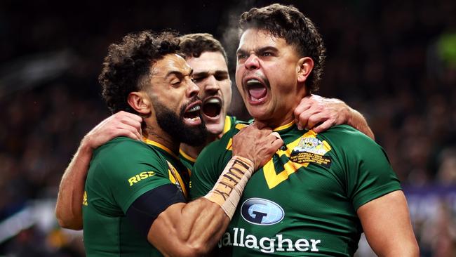 Latrell Mitchell celebrates a try during the Rugby League World Cup.