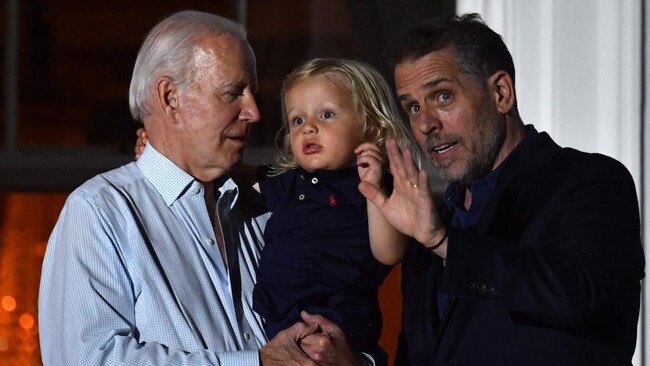 President Biden and his son Hunter with the president’s grandson Beau on July 4. Hunter Biden’s business dealings will also be under scrutiny and he has been described as a ‘security threat’.