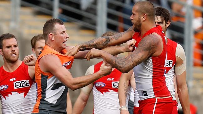 Lance Franklin and Steve Johnson tangle in last year’s finals. Picture: Getty Images