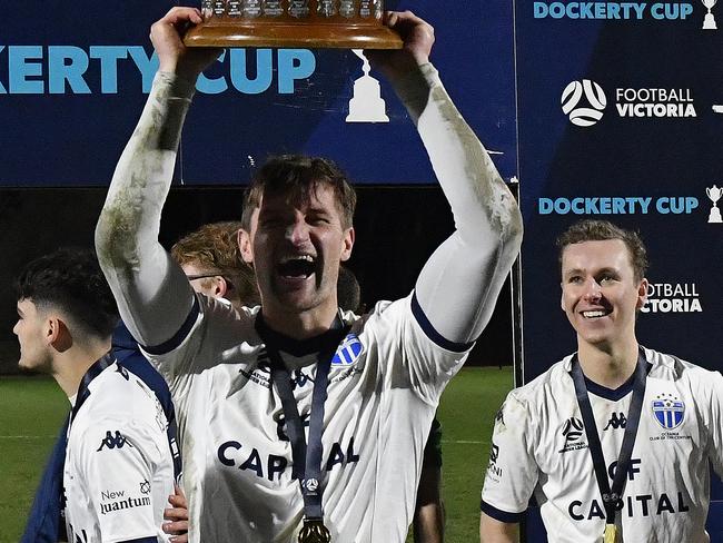 NPL: Football Victoria - Metropolitan / Dockerty Cup, Oakleigh Cannons FC vs South Melbourne FC at Main Pitch, Sports Drive, Bundoora, Victoria, Saturday 3rd August 2024: : The victorious South Melbourne team hold the Dockerty Cup. Photo: Andrew Batsch