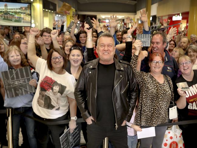 Jimmy Barnes among his people at an in-store signing for his new album, "Jimmy Barnes Criminal Record", at Elizabeth shopping centre. 2 June 2019. (AAP Image/Dean Martin)