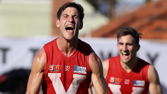 North Adelaide’s Aidan Tropiano celebrates his goal in the Roosters’ thrilling win over Woodville-West Torrens. Picture: Sarah Reed