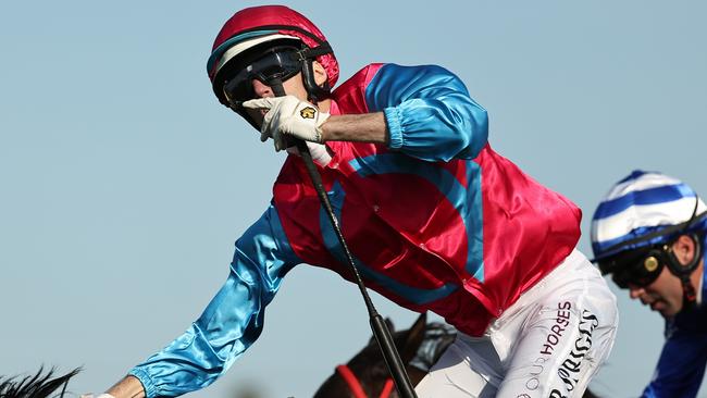 Blake Spriggs scored an emotional win aboard Headwall in The Warra at Kembla Grange. Picture: Jeremy Ng/Getty Images