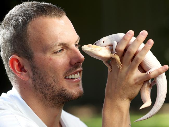 0/03/18 *** WARNING DO NOT RUN WITHOUT SPEAKING TO BRAD FLEET *** Kyle Chalmers with his bearded dragon and blue tongue lizards. picture CALUM ROBERTSON