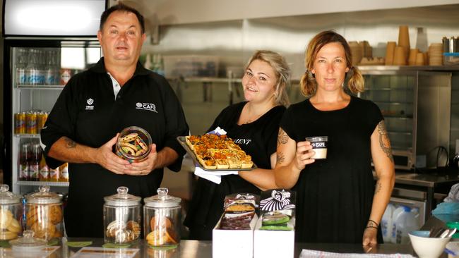 Brett Street cafe supervisor Allan Gibson and his staff were kept busy with the civic centre opening on Friday.