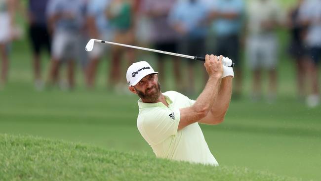 Dustin Johnson of the United States plays a shot from a bunker on the ninth hole during the second round of the 2022 PGA Championship at Southern Hills Country Club on May 20, 2022 in Tulsa, Oklahoma. (Photo by Christian Petersen/Getty Images)