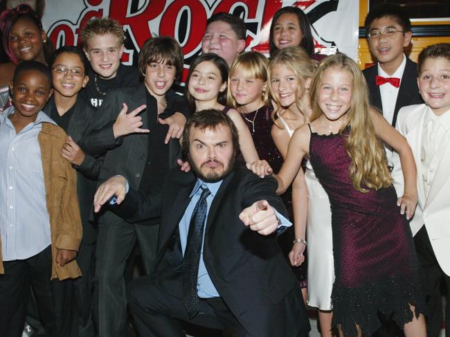 Hale (front in maroon dress), Massagli (back row) and Jack Black with the School of Rock cast at the Hollywood premiere in 2003. Picture: Frederick M. Brown/Getty Images