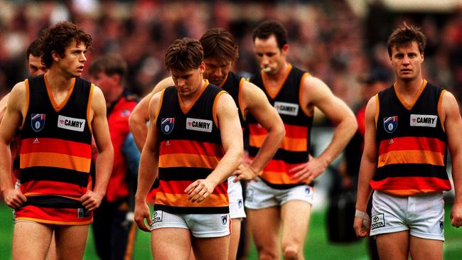 The Crows leave the field after being smashed by Melbourne in the 1998 Qualifying Final. More pain was to come on the training track the following week