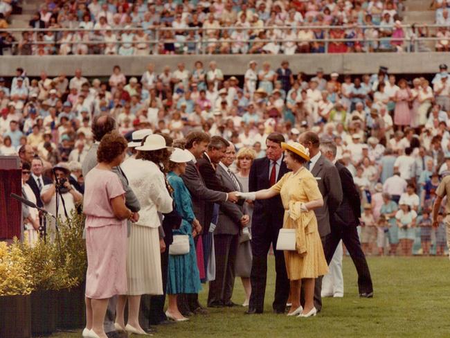 Queen Elizabeth II getting amongst it to open the stadium.