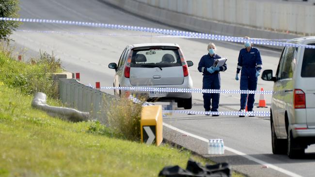 Forensic crews remain at the scene, hours after the drama unfolded. Picture: Andrew Henshaw