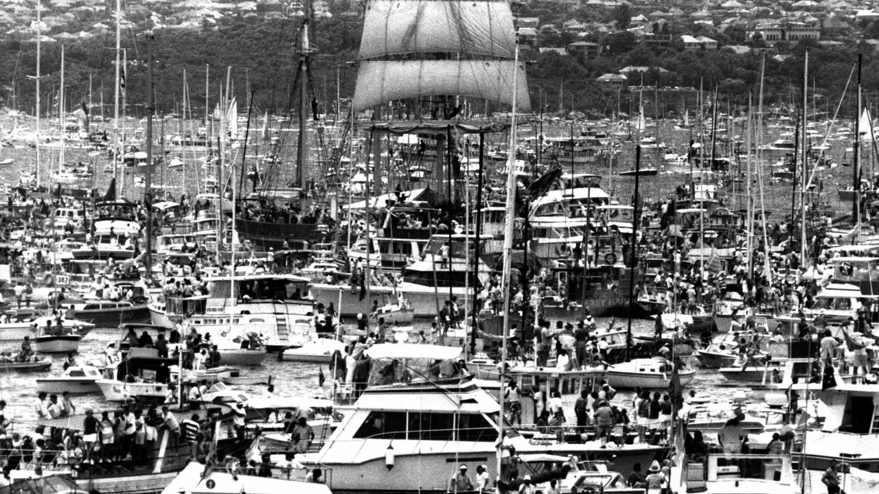 A packed Sydney Harbour as Sydney celebrated its bicentenary in 1988. Spectator craft near Opera House crowd around tall ship “Our Svanen” which was among ships in First Fleet re-enactment. Picture: News Corp