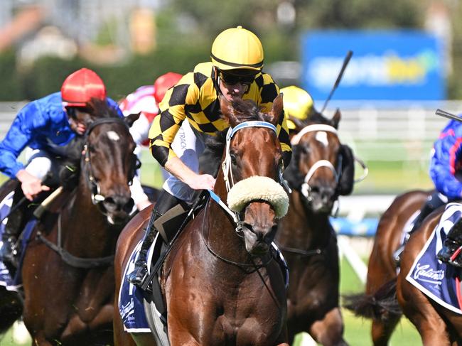 MELBOURNE, AUSTRALIA - MARCH 16: Mark Zahra riding Waltz On By winning Race 7, the Catanach's 150 Years The Mystic Journey, during The All-Star Mile Race Day at Caulfield Racecourse on March 16, 2024 in Melbourne, Australia. (Photo by Vince Caligiuri/Getty Images)