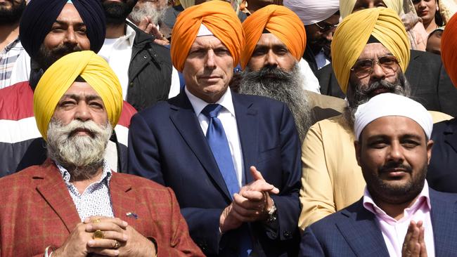 Former Australian Prime Minister Tony Abbott paying his respect at the Golden Temple in Amritsar on November 17. Picture: Narinder Nanu/AFP