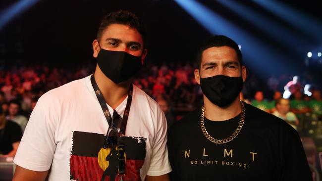 Latrell Mitchell and Cody Walker were given special dispensation to attend the fight. Picture: NCA NewsWire/Peter Lorimer.