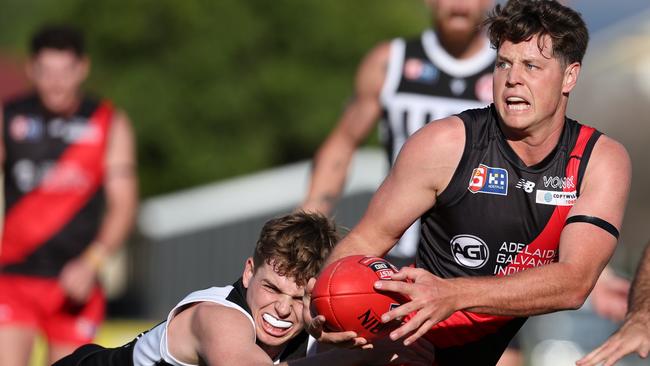 West Adelaide captain Isaac Johnson is tackled by Port Adelaide’s Hugh Jackson in Round 10 last season. Picture: David Mariuz/SANFL