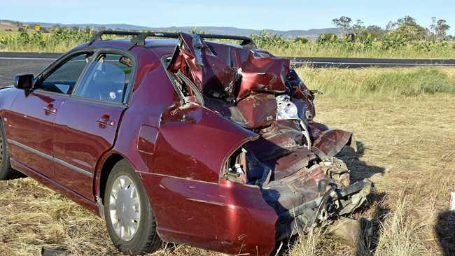 A car was severely damaged in a two-car crash near a sunflower field on the New England Highway on Saturday January 19. Picture: Elyse Wurm