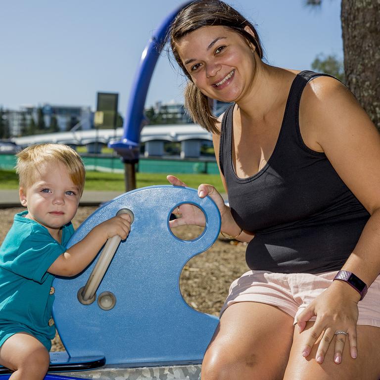 <p>Faces of the Gold Coast at Paradise Point. Ashley Iliffe with Elliot Iliffe, 20 months. Picture: Jerad Williams</p>