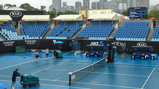 An outdoor court is dried. Picture: AAP/Vince Caligiuri