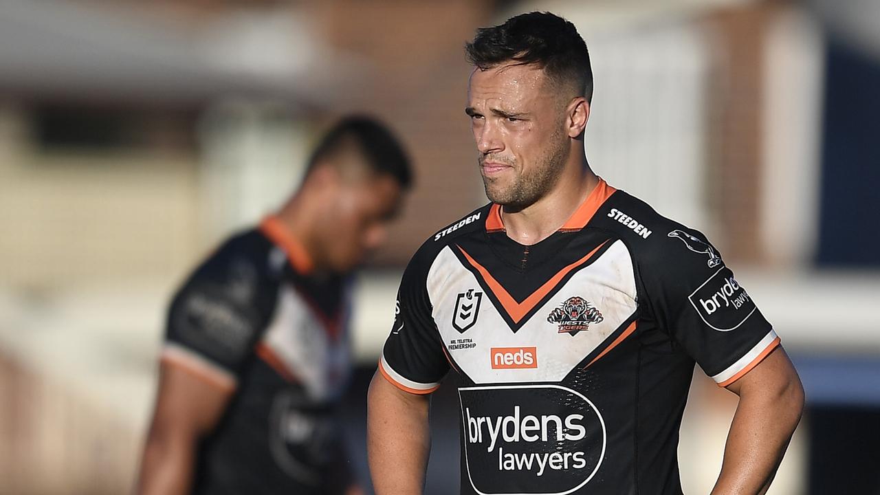 Luke Brooks says he is committed to seeing out his contract at Wests Tigers.