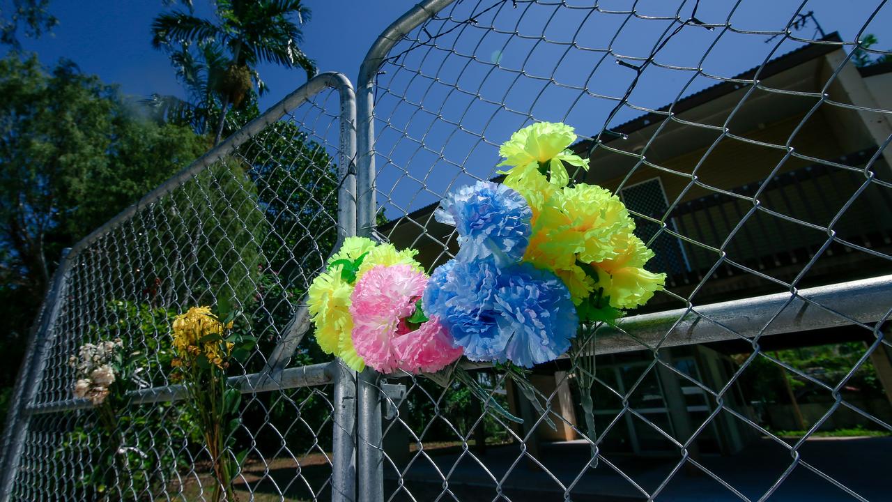 Floral tributes at the scene of the alleged murder. Picture: Glenn Campbell