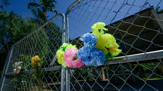 Floral tributes at the scene of the alleged murder. Picture: Glenn Campbell