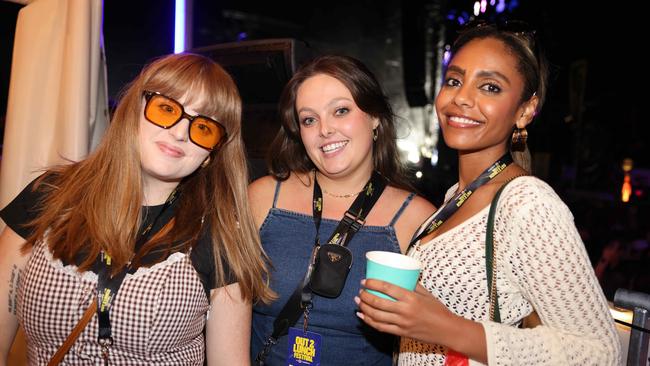 Taylah Williams, Molly McGrath and Tigray Tedla at the Out 2 Lunch Festival 2025 on Saturday at Broadwater Parklands Southport for Gold Coast at Large. Picture, Portia Large.