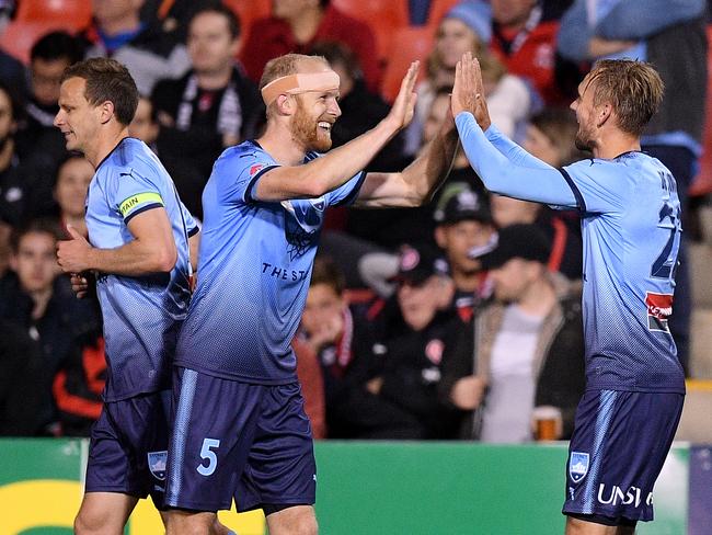 Siem de Jong of Sydney (right) celebrates with Jop van der Linden after scoring a goal during the FFA Cup Semi Final between the Western Sydney Wanderers and Sydney FC at Panthers Stadium in Sydney, Saturday, October 6, 2018. (AAP Image/Dan Himbrechts) NO ARCHIVING, EDITORIAL USE ONLY