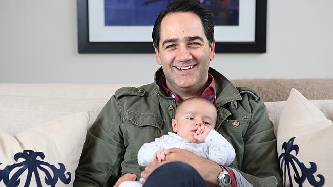 Breakfast radio host Michael 'Wippa' Wipfli with baby Jack, nine months. Pictures: Bob Barker