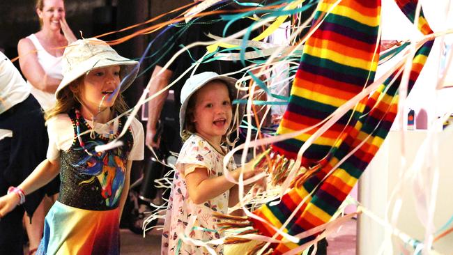 Betty Bowtell, 6, and Elsie Bowtell, 3, get blown around by fans in the Tinkering Tank part of the final day of the Cairns Children's Festival, held at the Tanks Arts Centre, Edge Hill. Picture: Brendan Radke
