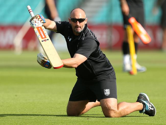 Michael di Venuto in action during his time as Surrey head coach.