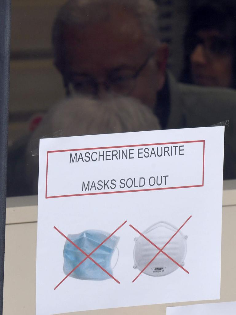 Signs showed face masks had sold out in some shops. Picture: AFP/ANDREA PATTARO