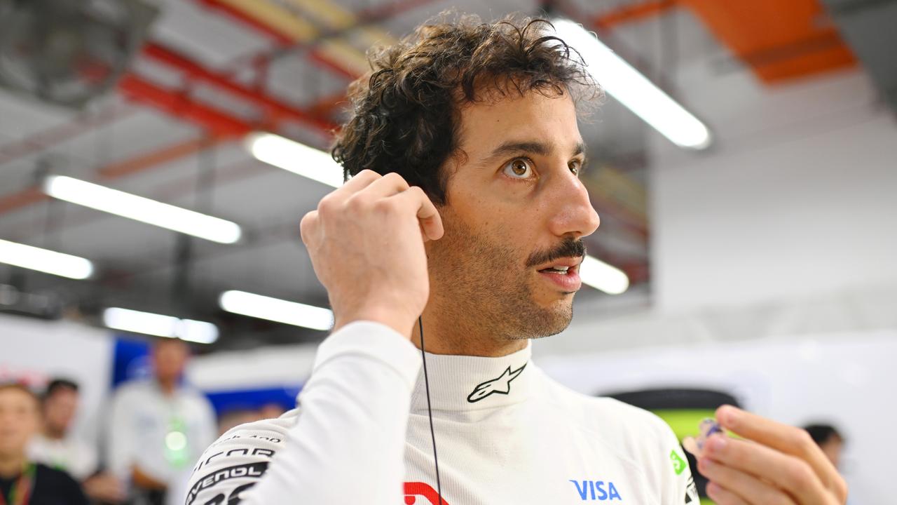 Daniel Ricciardo of Australia and Visa Cash App RB prepares in the garage. Photo by Rudy Carezzevoli/Getty Images.