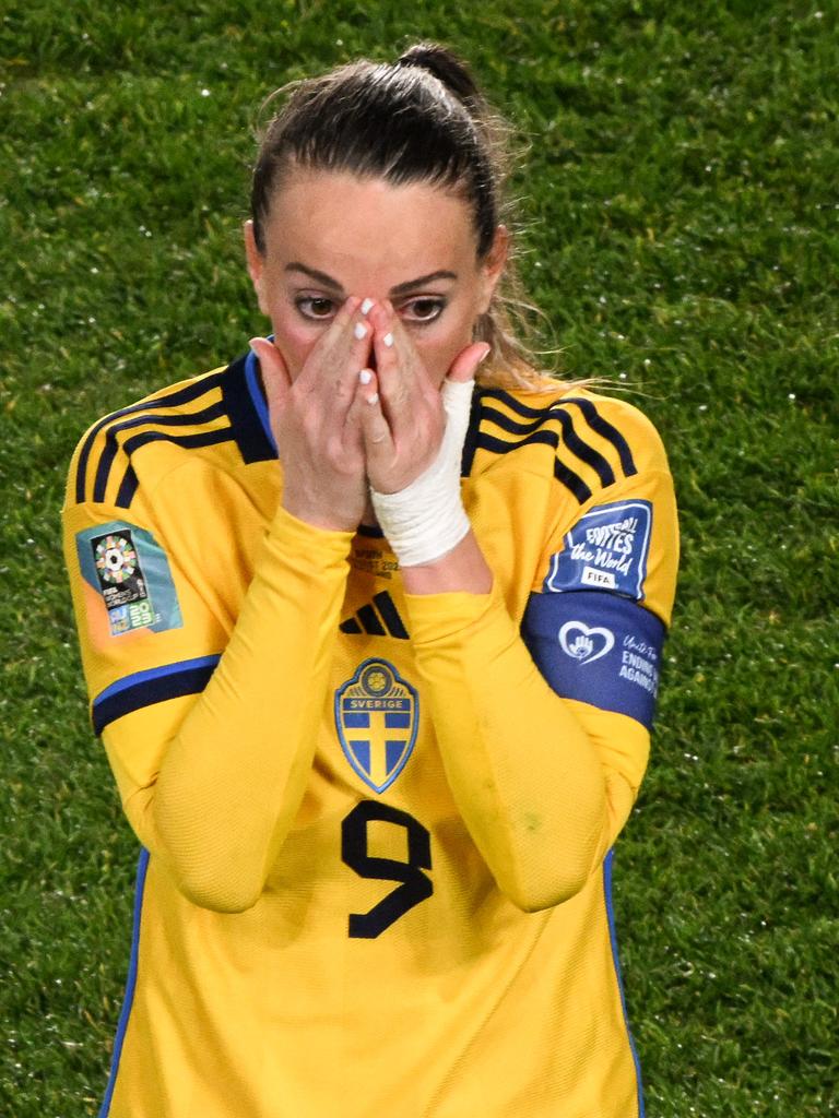 As Sweden get to wear yellow. (Photo by Saeed KHAN / AFP)