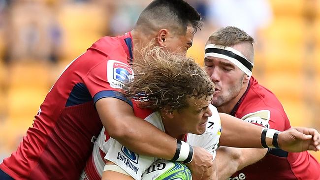 BRISBANE, AUSTRALIA - APRIL 28:  Andries Coetzee of the Lions takes on the defence during the round 11 Super Rugby match between the Queensland Reds and the Lions at Suncorp Stadium on April 28, 2018 in Brisbane, Australia.  (Photo by Bradley Kanaris/Getty Images)