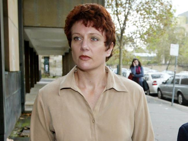 EMBARGO FOR TWAM 24 SEPTEMBER 2022. FEE MAY APPLY.  28/04/2003 Kathleen Folbigg leaving Darlinghurst Supreme Court with support from The Salvation Army. She is accused of murdering four of her children between 1989 and 1999 in Newcastle area. Murder.