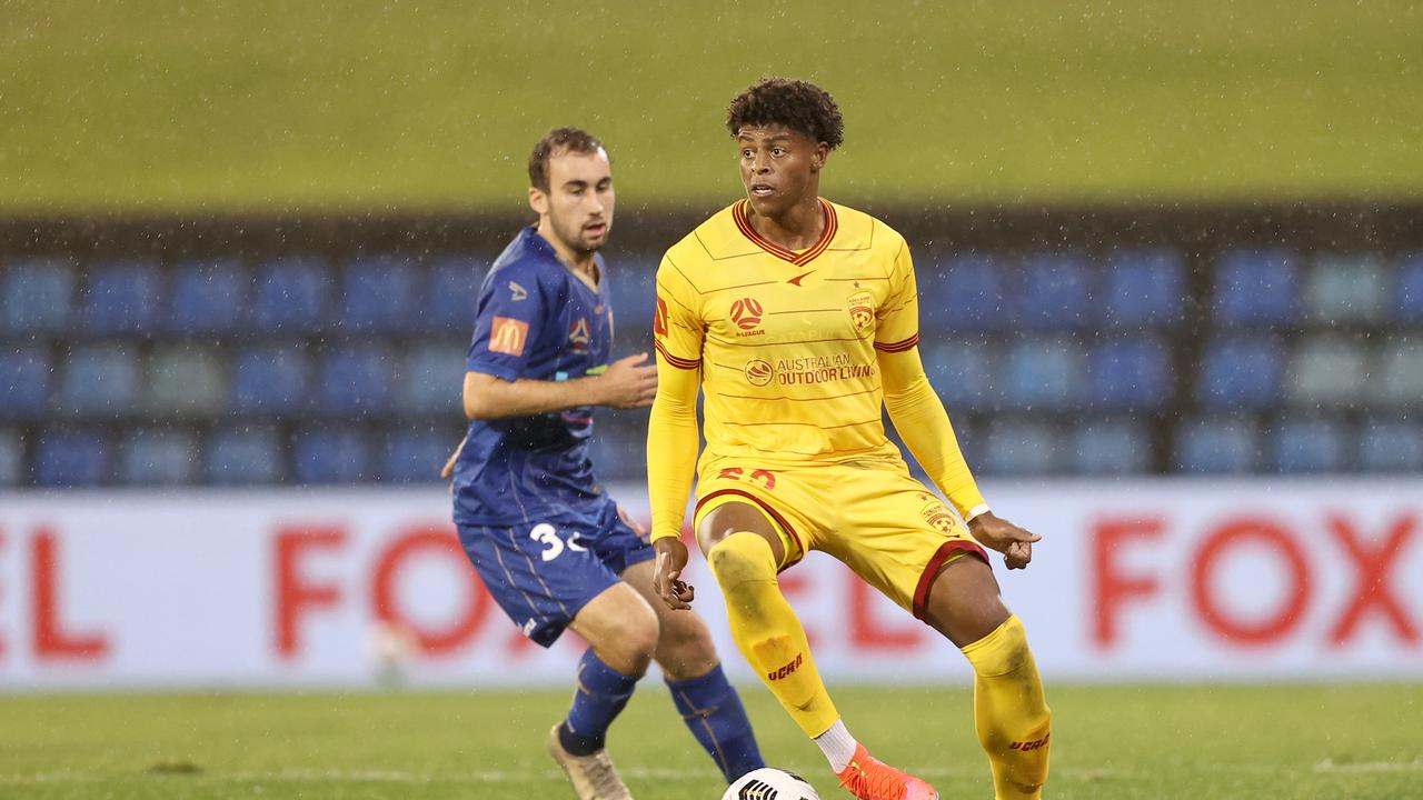 Former Adelaide United and Western Sydney striker Kusini Yengi (right) is on the verge of a Socceroos debut. Picture: Ashley Feder/Getty Images