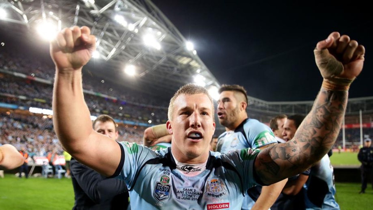 Trent Hodkinson celebrates after the Blues finally ended their Origin drought in 2014. Picture: Getty Images