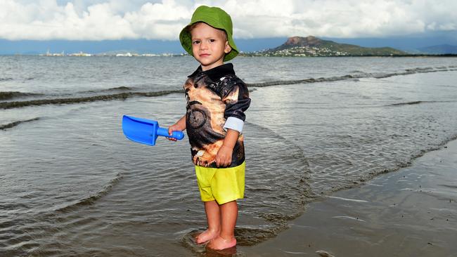 Weather Pic; Arlo Fraser 1, runs around on the beach at Pallarenda