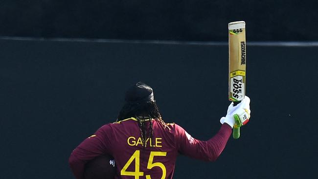 Chris Gayle made a symbolic gesture to those at the ground after being dismissed. Will he play again for the West Indies? Picture: AFP