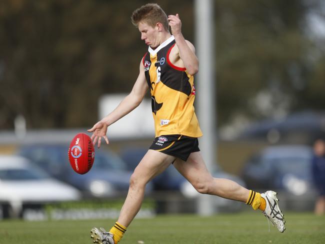 Jarryd Barker takes a kick for the Stingrays.