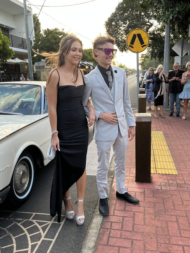 Byron Mills and Georgia Toplis arrive at the formal in a 1962 Ford Thunderbird.