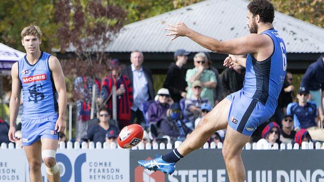 Sturt’s Abe Davis kicks one of his matchwinning six goals against Norwood. Picture: Emma Brasier.