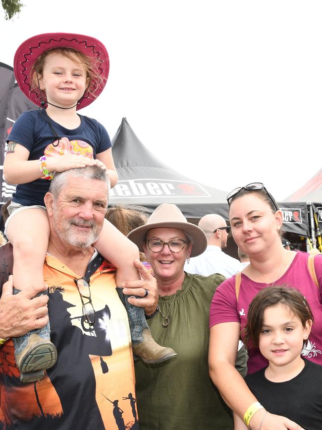 Jasmine Cumming gets a lift from Larry Hoffmann, with Karen Hoffman and Karen and Lily Cumming. Meatstock Festival, Toowoomba showgrounds. April 2022