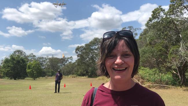 Extraction Artisan Coffee’s Heather Scott watches as her business’s first coffee is delivered by drone. PHOTO: JUDITH KERR